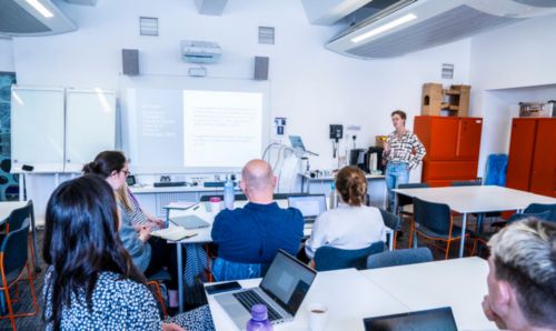 A member of staff taking a workshop for other researchers