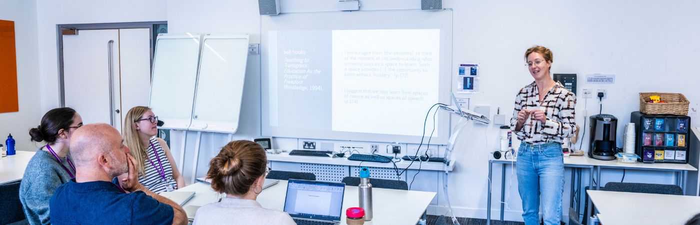 Researchers in a workshop setting with an instructor